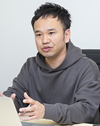 本田 哲朗氏